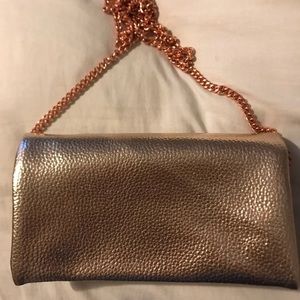 Rose gold chain purse / clutch.
